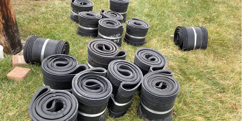 HydraTite Rubber Seals in the grass waiting to be installed