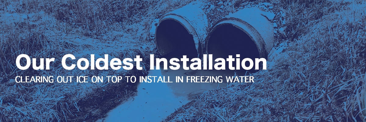 two culverts with frozen water in them, 'Our Coldest Installation, CLEARING OUT ICE ON TOP TO INSTALL IN FREEZING WATER'