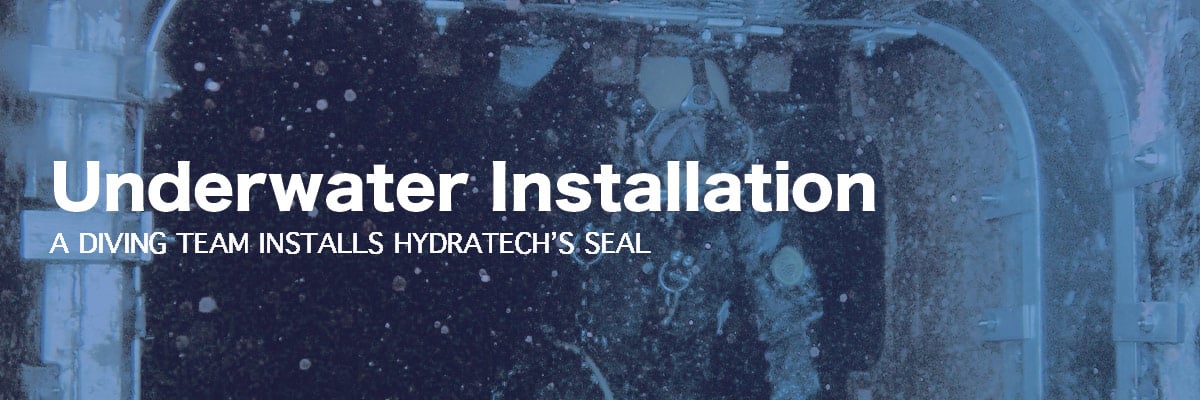 Diver installing HydraTite underwater, 'Underwater Installation, A DIVING TEAM INSTALLS HYDRATECH'S SEAL'