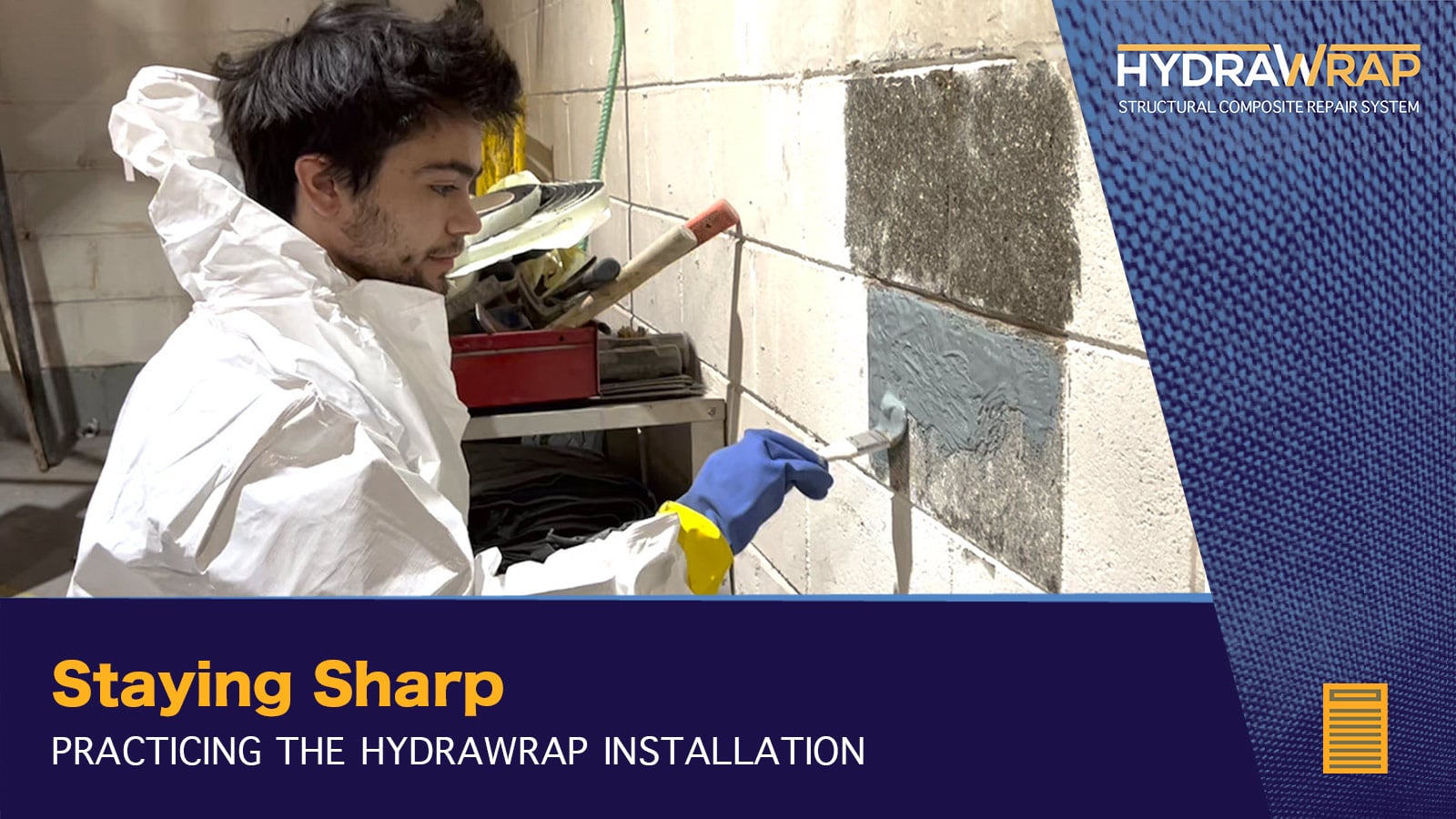 Field Technician applying primer to a wall in preparation for HydraWrap installation, 'Staying Sharp, Practicing The Entire HydraWrap Installation'
