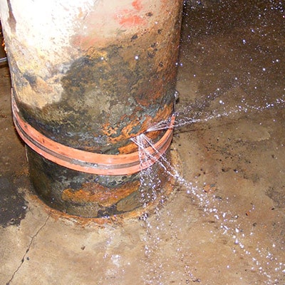 Water spraying out of an ash sluice pump intake manifold