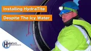 Technician installing HydraTite in a pipe