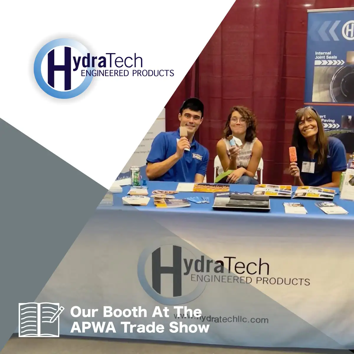 Three people sitting at a table at the HydraTech booth at APWA
