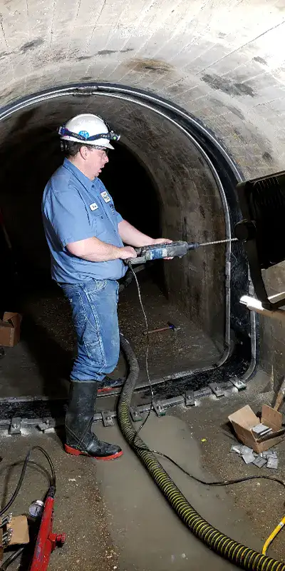 Retaining bands sitting at the invert of a pipe near the joints