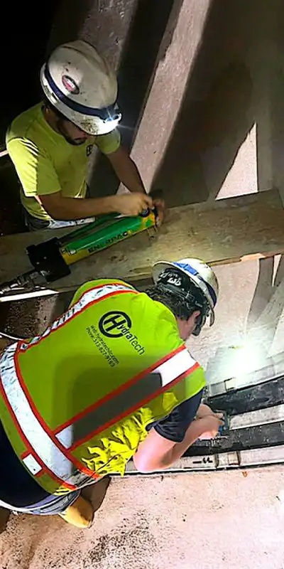 Installing-HydraTite-In-A-Pipe Retaining bands loosely placed over a rubber seal