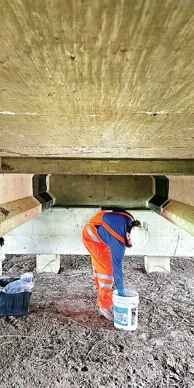 A-couple-portions-of-a-bridges-support-rehabilitated-with-carbon-fiber-wrap Two HydraTite Installers