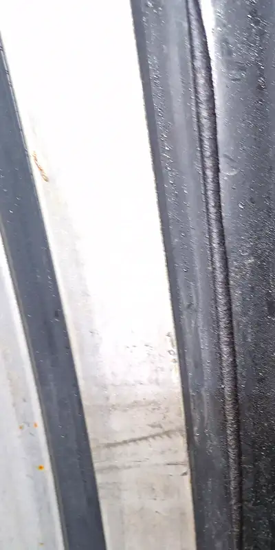 Retaining bands loosely placed over a rubber seal