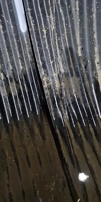 Retaining bands sitting at the invert of a pipe near the joints