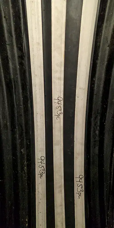 Retaining bands sitting at the invert of a pipe near the joints