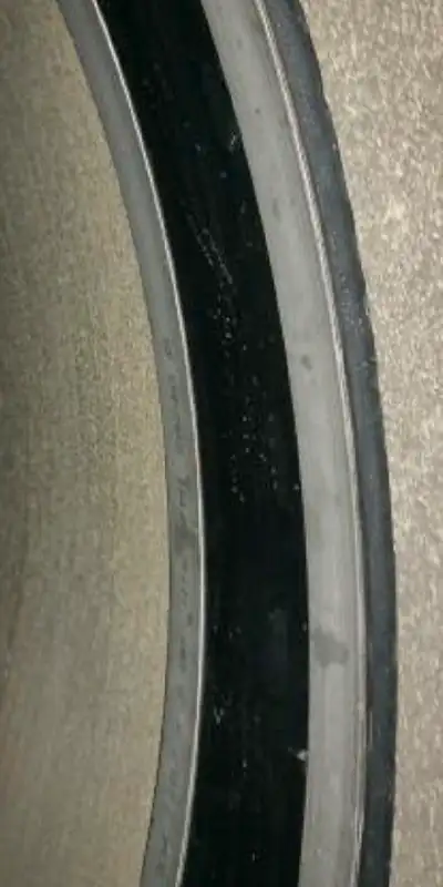 Retaining bands loosely placed over a rubber seal