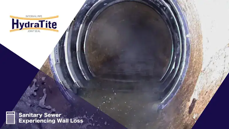 Three interlocked HydraTite seals installed over a compromised point in a pipe, 'Sanitary Sewer Experiencing Wall Loss'