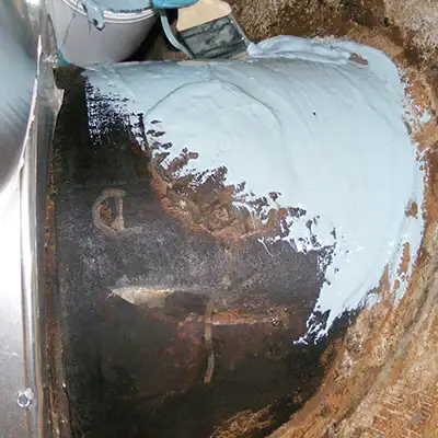 A pavilion whose posts have been reinforced with HydraWrap