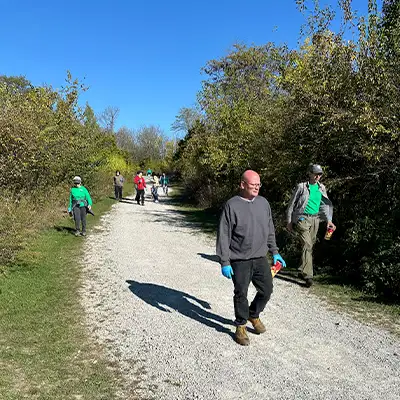 Picking seeds with a gloved hand