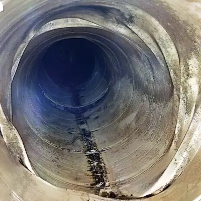 A pipe that has a liner that is becoming disconnected from the interior