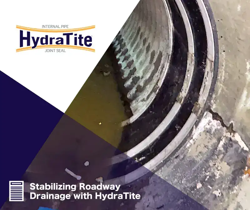 HydraTite installed over a joint with three retaining bands, 'Stabilizing Roadway Drainage with HydraTite'