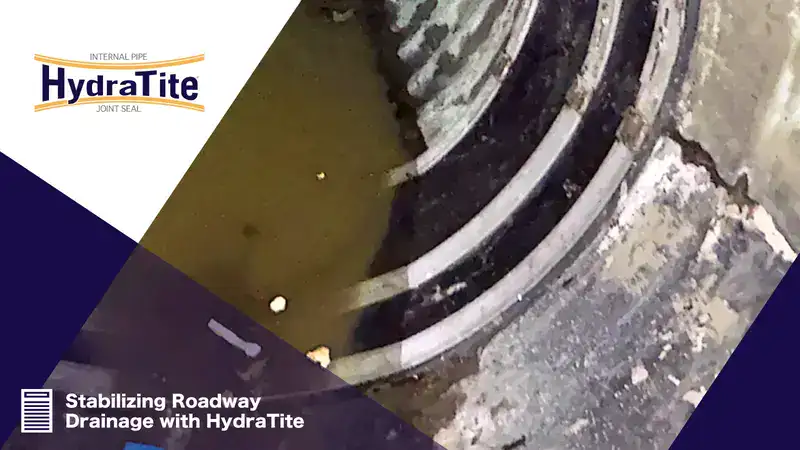 HydraTite installed over a joint with three retaining bands, 'Stabilizing Roadway Drainage with HydraTite'