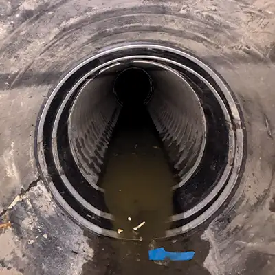 A pipe repaired with a HydraTite seal, installed with three retaining bands.