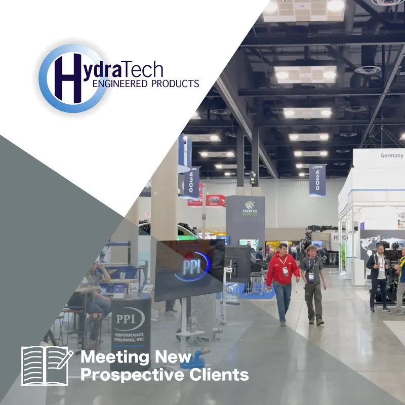 A tradeshow with people looking at booths