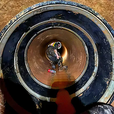A large-diameter pipe being sealed with a double-wide HydraTite seal