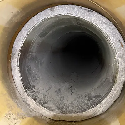 A pipe transition joint between a concrete pipe and a steel pipe